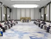 习近平会见国际奥林匹克委员会主席巴赫
